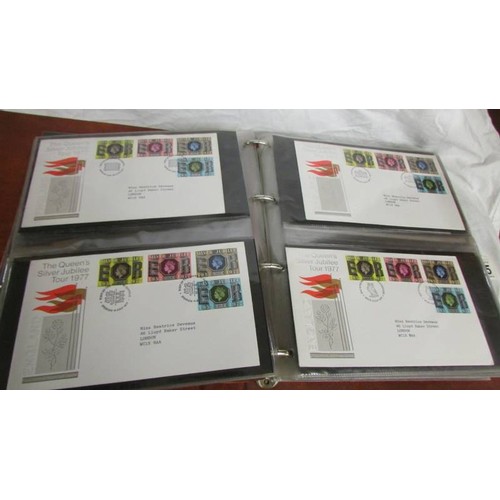 1225 - Two folders of first day covers.