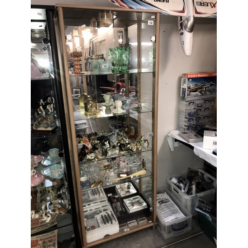 108 - A mid to late 20th century two door display cabinet. Collect only