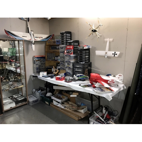 109 - A large quantity of model radio control aircraft & accessories including engines, 1 x 6 channel R/C ... 