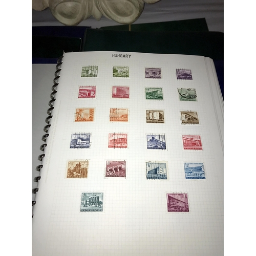 132 - 6 albums of World stamps