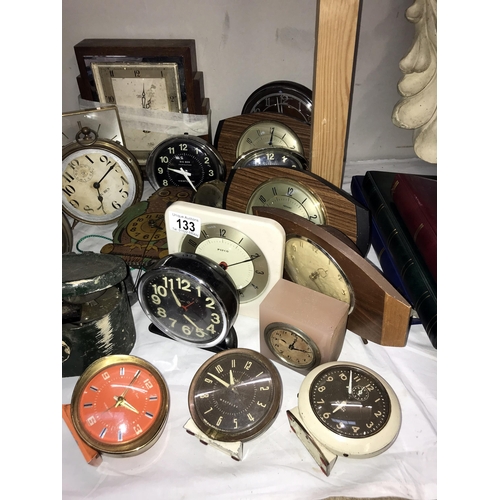 133 - A large lot of alarm & mantle clocks (including some for spares & repairs)