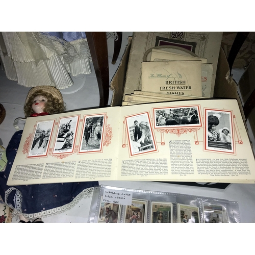 139 - A quantity of cigarette cards & books Circa 1930's