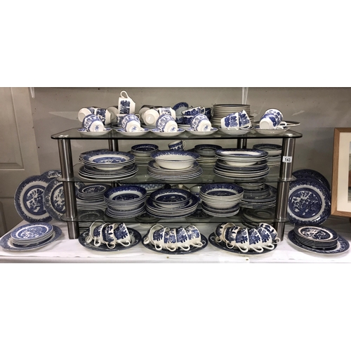 143 - Approximately 250 pieces of blue & white dinnerware including Wedgwood. Collect only