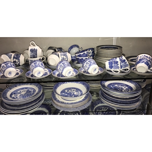 143 - Approximately 250 pieces of blue & white dinnerware including Wedgwood. Collect only