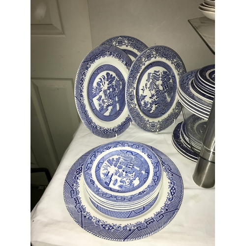 143 - Approximately 250 pieces of blue & white dinnerware including Wedgwood. Collect only