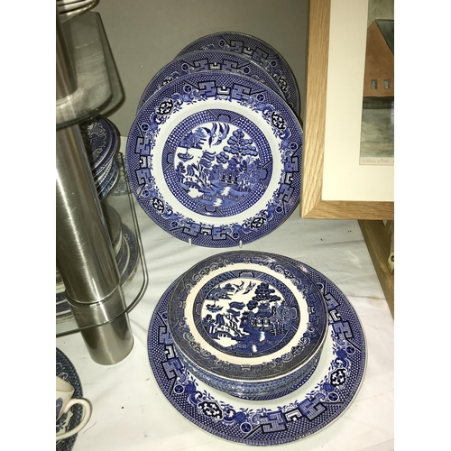 143 - Approximately 250 pieces of blue & white dinnerware including Wedgwood. Collect only