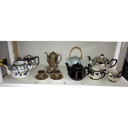 92 - A quantity of teapots including Japanese hand painted tea set etc.