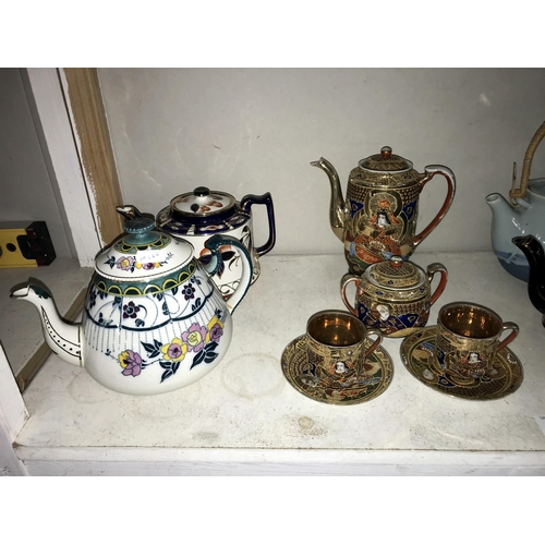 92 - A quantity of teapots including Japanese hand painted tea set etc.