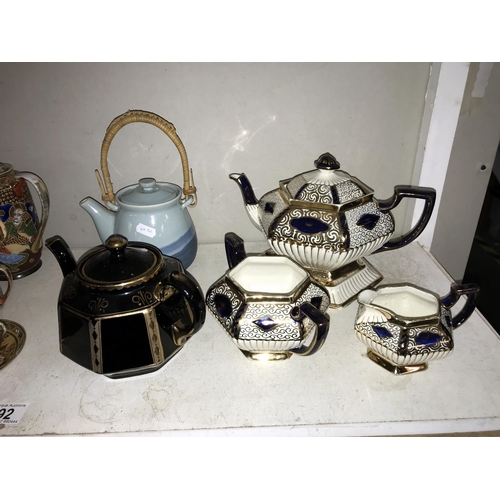 92 - A quantity of teapots including Japanese hand painted tea set etc.