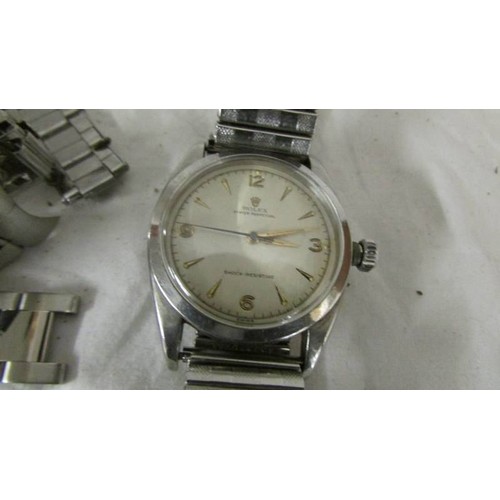 1070A - A vintage Rolex Oyster perpetual wrist watch, (ticking but needs attention).