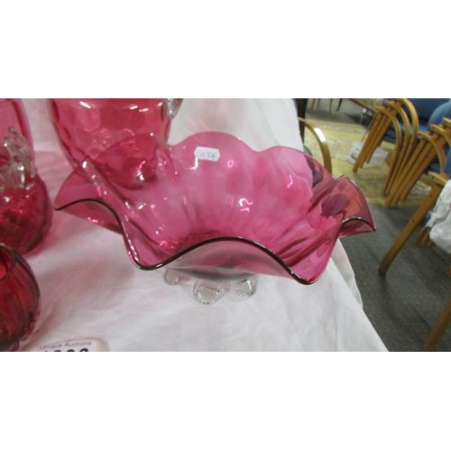 1306 - 6 pieces of cranberry glass including bowl, jug etc.,