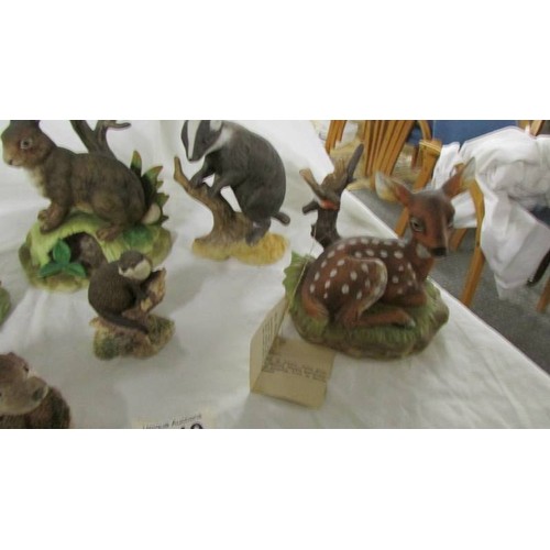 1319 - Six woodland animal figures.