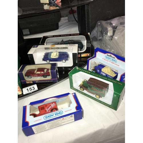 153 - A quantity of boxed die cast including cameo, Holland & Barret VW mug etc.