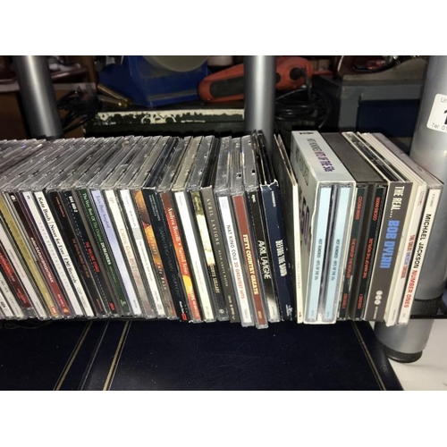 158 - A quantity of music CD's including Adele, Kate Bush & The Rolling Stones etc.