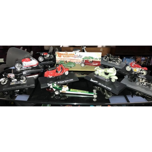 162 - A selection of unboxed die cast cars & scooters including Vespa & MV Augusta etc.