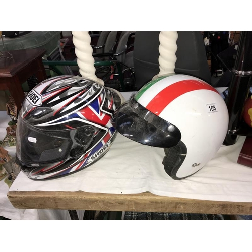 166 - 2 motorcycle helmets