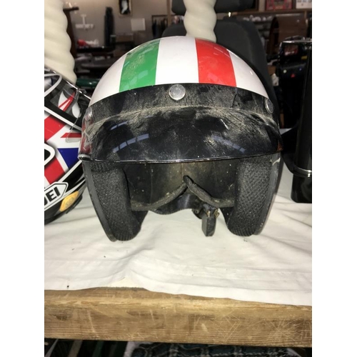 166 - 2 motorcycle helmets