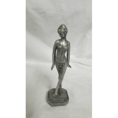 1252 - A pair of art deco style white metal figurines, 9 - 10 cm tall.