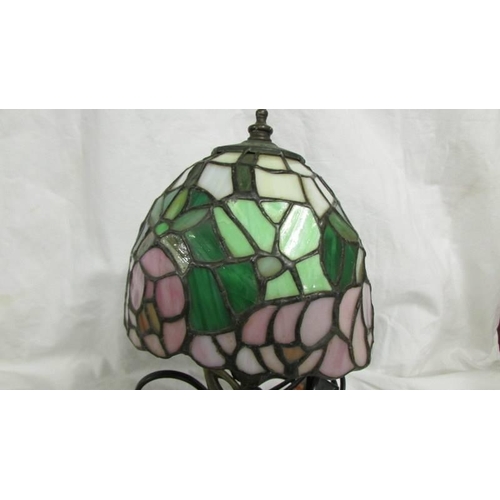 1255 - An art deco style white metal table lamp with leaded glass shade.