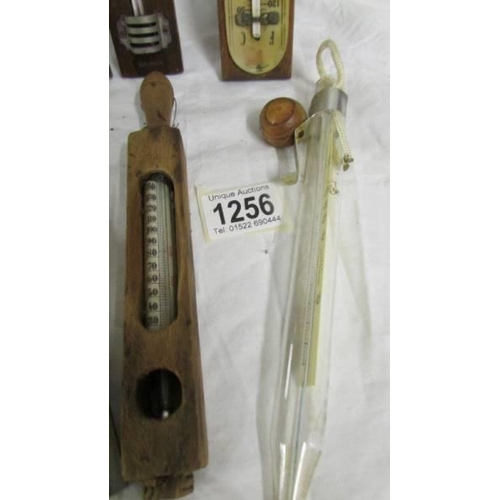 1256 - A quantity of old thermometers.