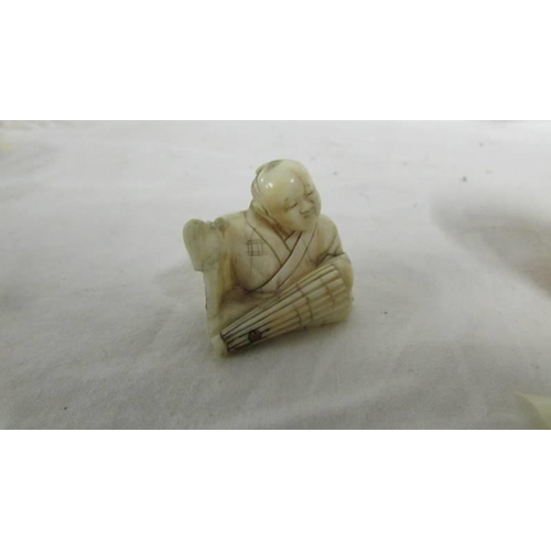 1264 - Two antique ivory netsuke.