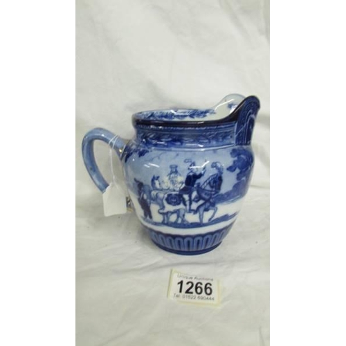 1266 - A Royal Doulton blue and white Eglington Tournament jug.