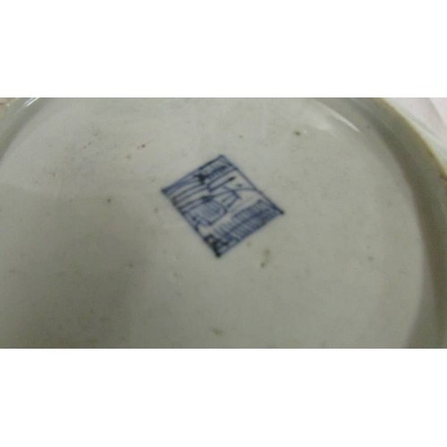 1353 - Four hand painted chinese plates, one chipped others good.