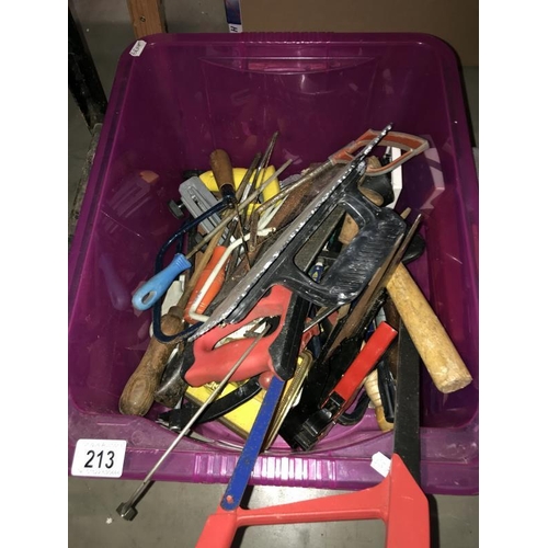 213 - A large box of tools including hacksaws & crwo bar etc.