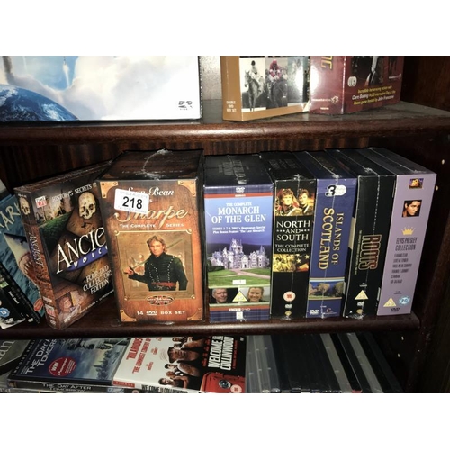 218 - A quantity of DVD's including box sets (3 shelves) (COLLECT ONLY)