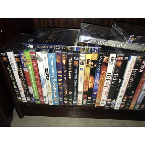 218 - A quantity of DVD's including box sets (3 shelves) (COLLECT ONLY)