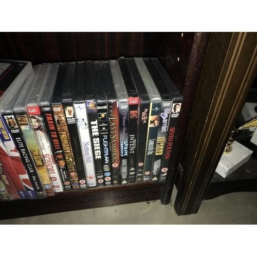 218 - A quantity of DVD's including box sets (3 shelves) (COLLECT ONLY)