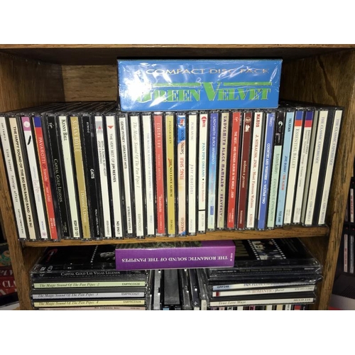 226 - A quantity of music CD's including Country, the 3 tenors etc. including CD storage case