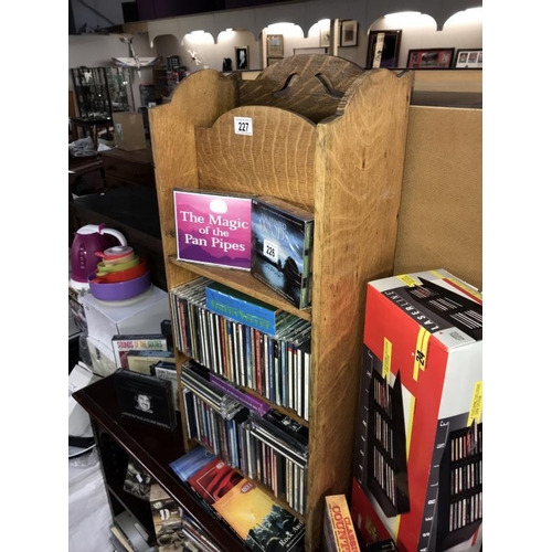 227 - A 1930's/50's oak book stand (COLLECT ONLY)