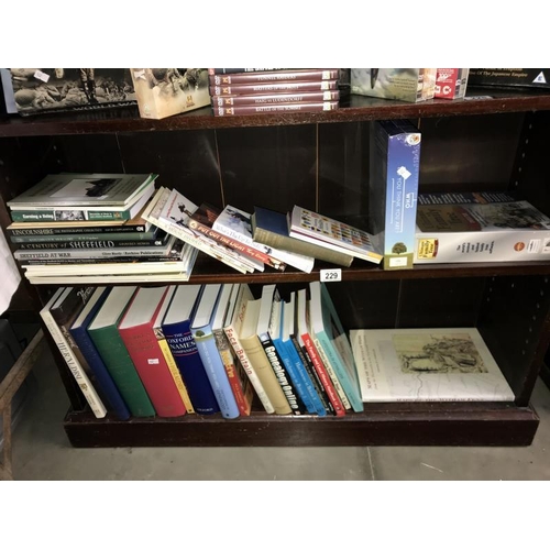 229 - A selection of reference books including Heraldry, Genealogy, Sheffield etc. (2 shelves)