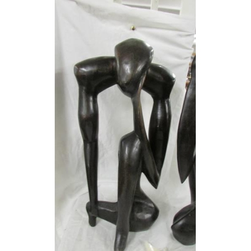 1394 - A pair of contemporary hardwood figures.