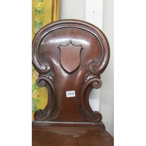 1419 - A Victorian mahogany hall chair.