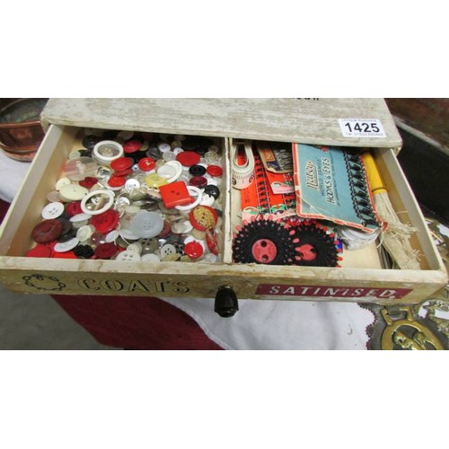 1425 - A vintage Coats Satinised machine twist shop display chest of drawers with contents and a tin of cot... 