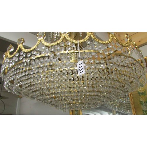 1431 - A large gilt and glass chandelier.