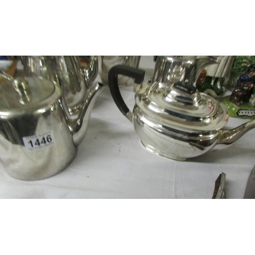 1446 - Five silver plate teapots.