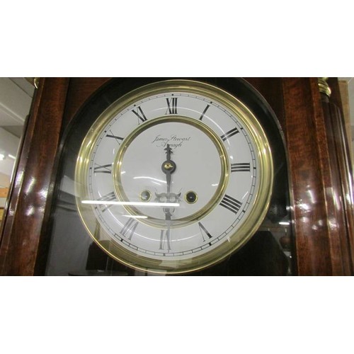 1454 - A mahogany double weight wall clock.