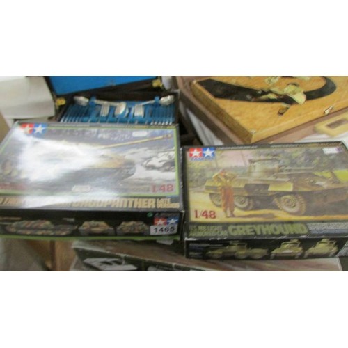 1465 - Five tank model kits and a model boat kit.