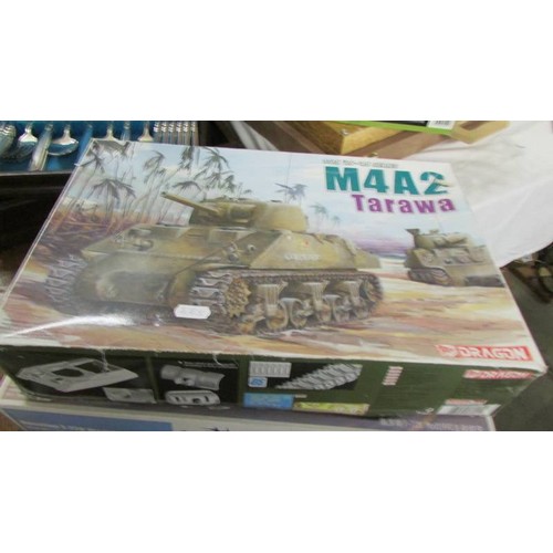 1465 - Five tank model kits and a model boat kit.