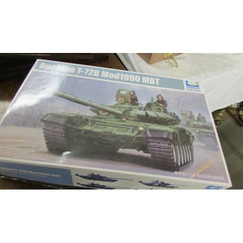 1465 - Five tank model kits and a model boat kit.