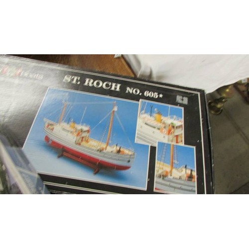 1465 - Five tank model kits and a model boat kit.