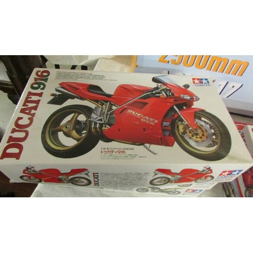 1472 - 4 Tamiya 1/12 scale motorcycle model kits, 2 Ducatti, 1 Hamond, 1 Yamaha, 1 started, other 3 sealed.... 