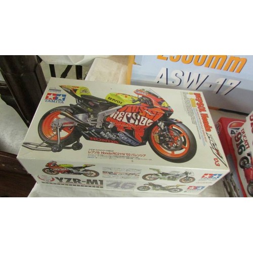 1472 - 4 Tamiya 1/12 scale motorcycle model kits, 2 Ducatti, 1 Hamond, 1 Yamaha, 1 started, other 3 sealed.... 