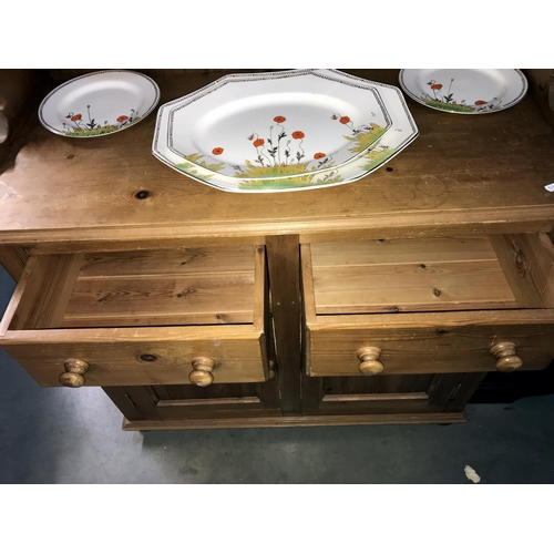 231 - A solid pine kitchen dresser (92cm x 41cm x 183cm) (COLLECT ONLY)