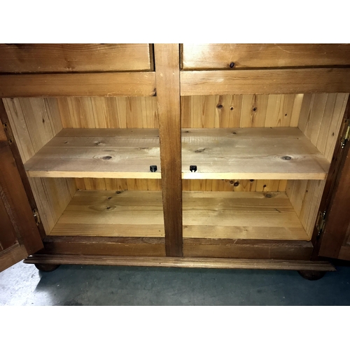 231 - A solid pine kitchen dresser (92cm x 41cm x 183cm) (COLLECT ONLY)