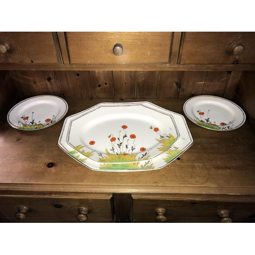 232 - A quantity of Crown Ducal poppy platters & plates