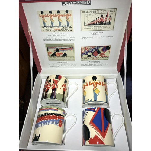 235 - A boxed set of Underground Trooping The Colour mugs, 2 Portmeirion garden dinner plates, A Royal Dou... 